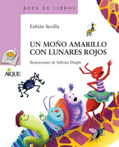 UN MOÑO AMARILLO CON LUNARES ROJOS